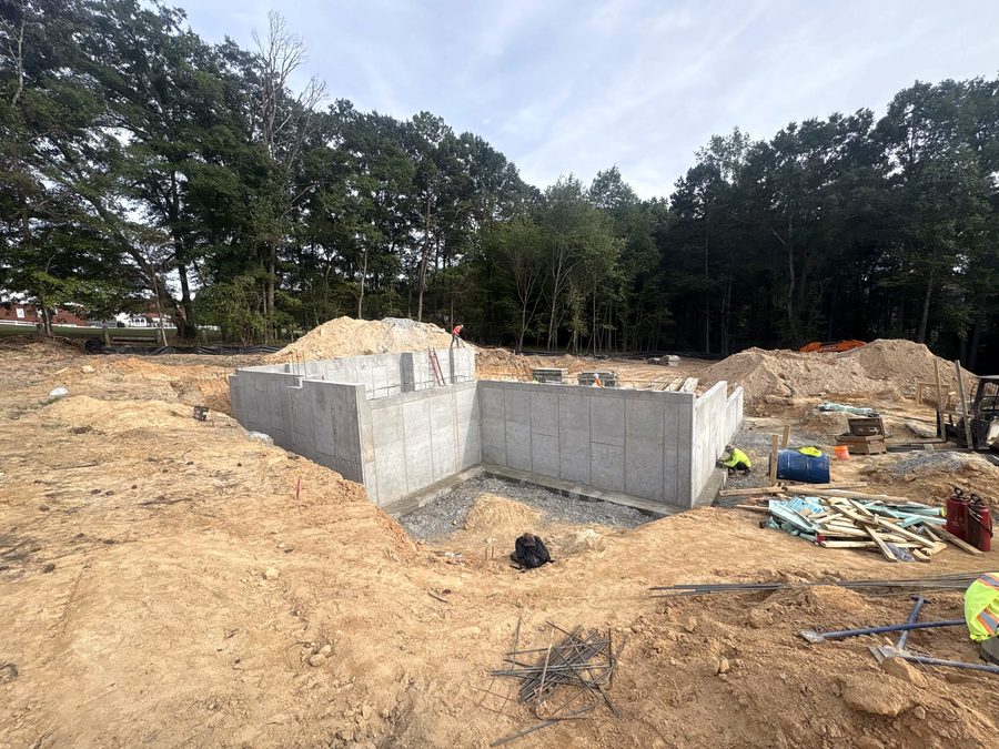 Poured concrete foundation walls on a cleared site
